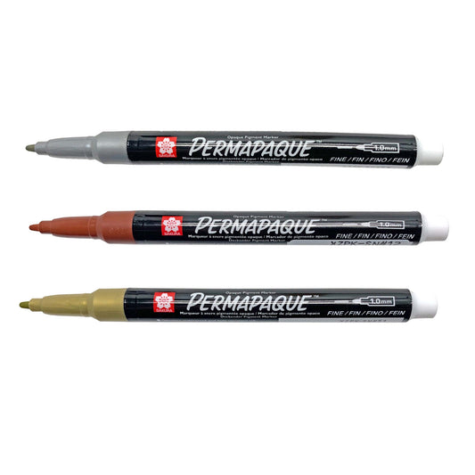 Three Permapaque metallic markers in silver, gold, and copper.