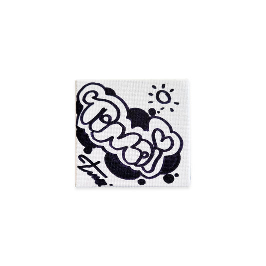 White canvas with black graffiti 