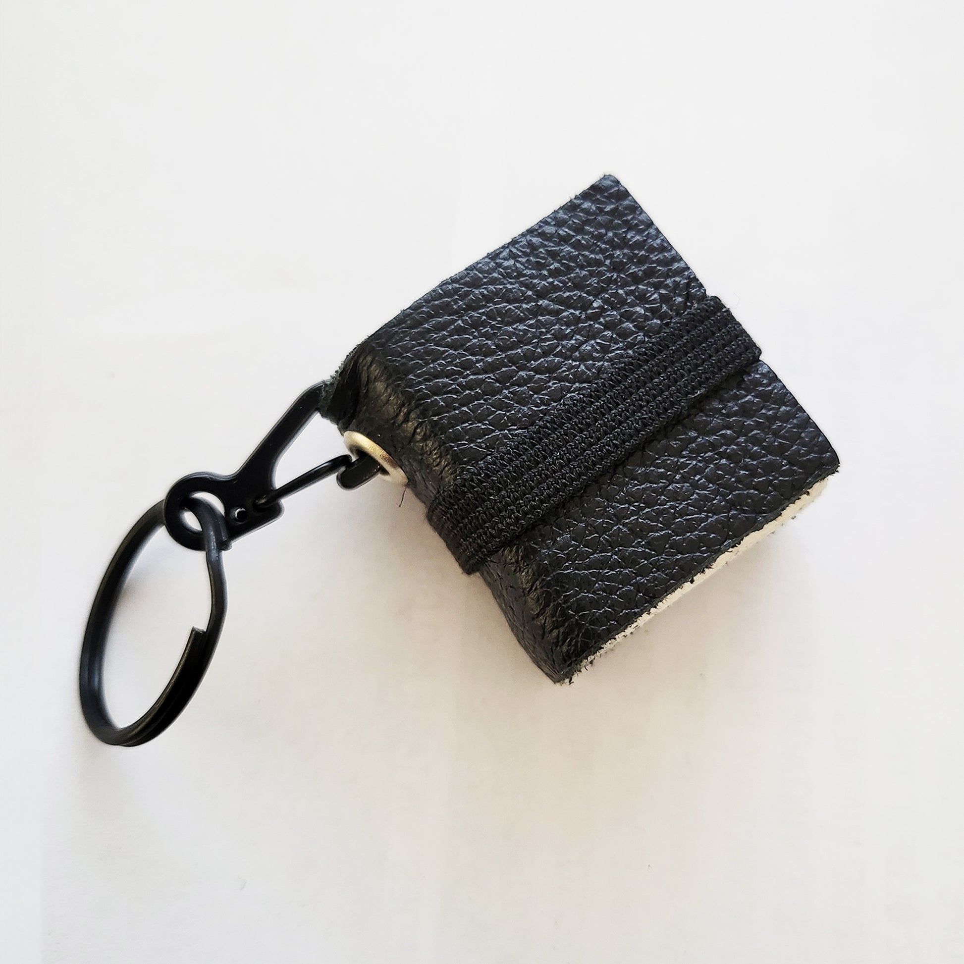 Handmade miniature keychain black book sketchbooks.