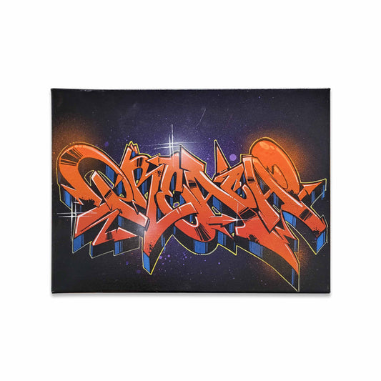 A black canvas with bright orange graffiti style letters painted.