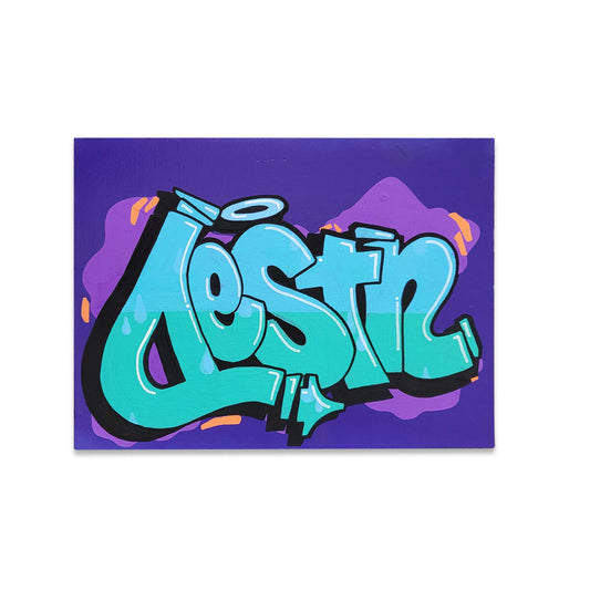 A purple canvas with blue and black graffiti style letters.