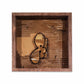 Wooden framed cardboard collage with a graffiti bubble style letter.