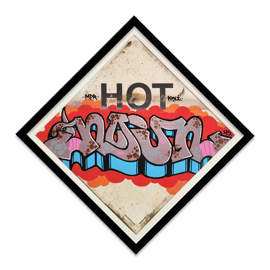 Framed trucking warning placard with graffiti style letters painted.