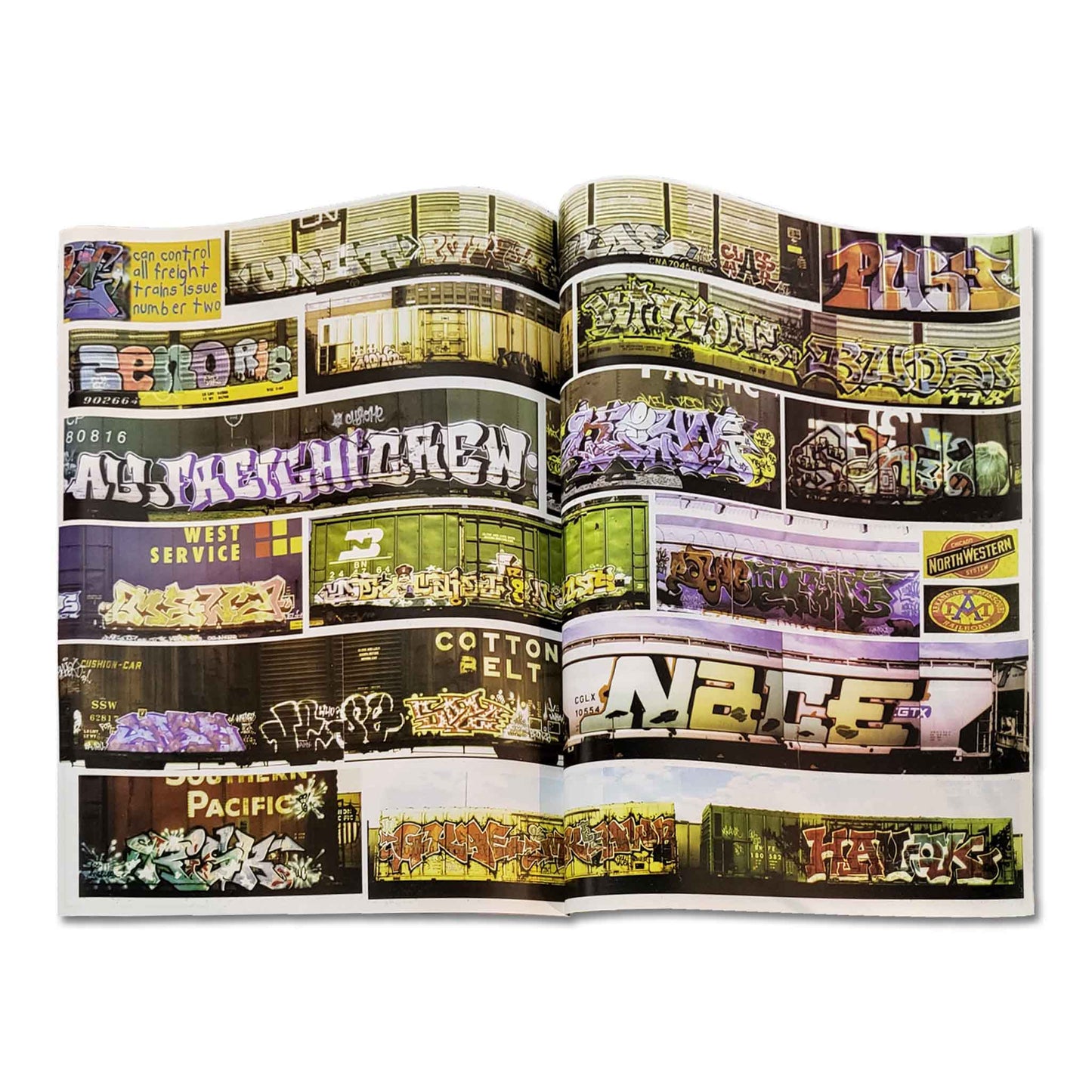 Open book displaying a collage of colorful train car graffiti.