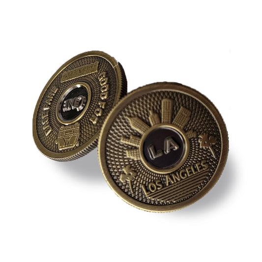 black and gold Gaso token pin