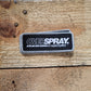 overspray logo patch in black and white with a silver frame