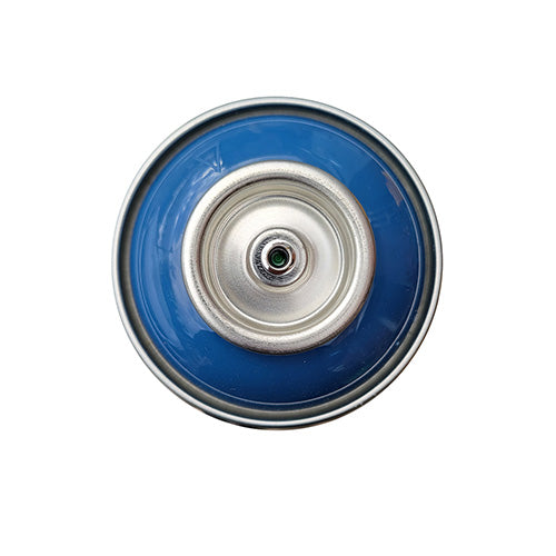 The top of a spray paint can, with a medium navy blue color swatch in the middle of the silver, metal rings of the can.