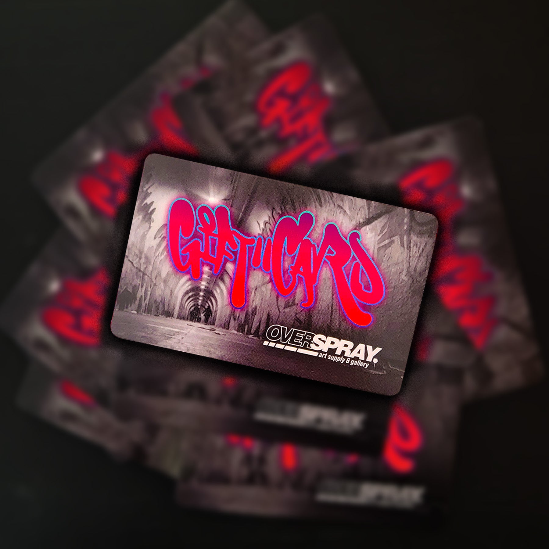 overspray gift card floating over a blurry background.