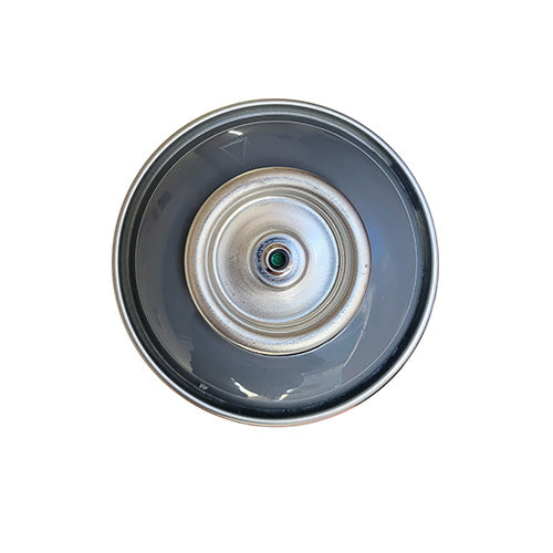 The top of a spray paint can, with a medium blue grey color swatch in the middle of the silver, metal rings of the can.