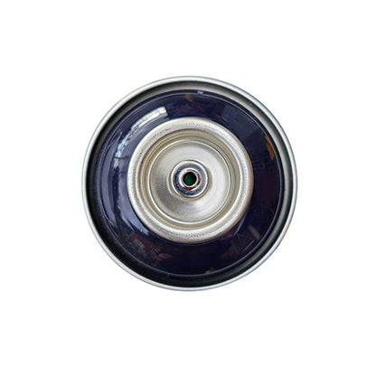 The top of a spray paint can, with a black purple color swatch in the middle of the silver, metal rings of the can.