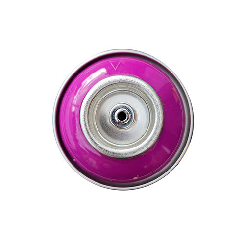 The top of a spray paint can, with a violet color swatch in the middle of the silver, metal rings of the can.